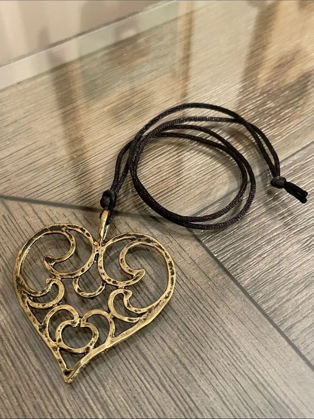 Vintage Style Antique Gold tone Openwork Heart Pendant Necklace on a Black Cord